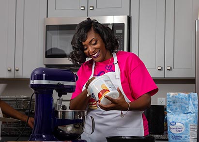 entreprenuer and baker prepares to bake a pie