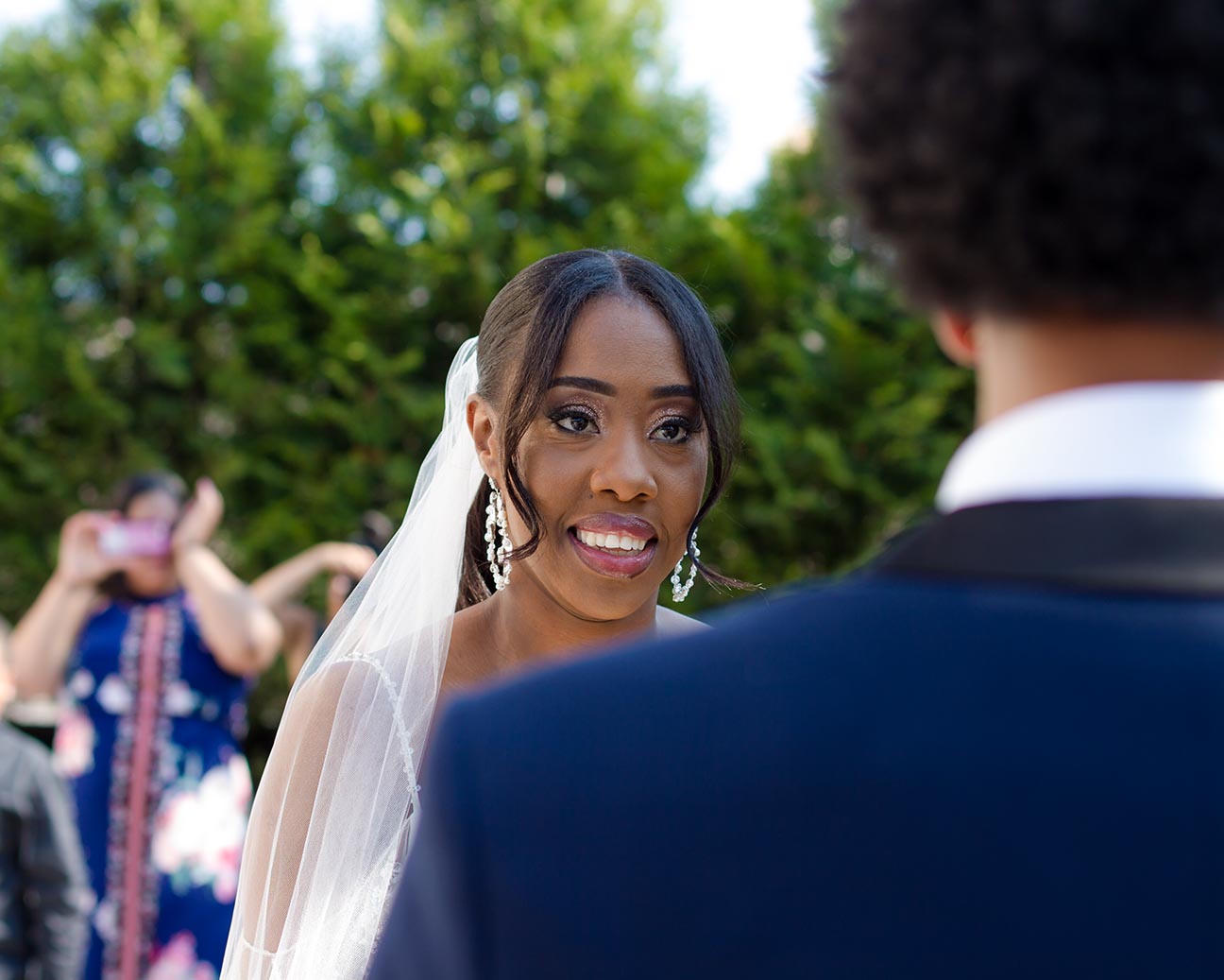 a most beautiful bride gazes at her husband